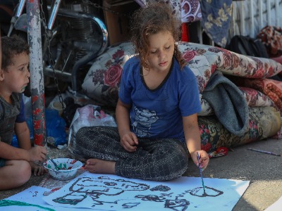 Layla engaged in art therapy, expressing creativity